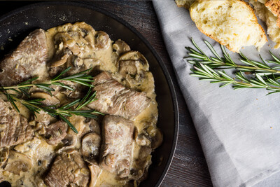 Individual Medallions of Pork Fillet with Mushrooms in a Creamy Herb Sauce