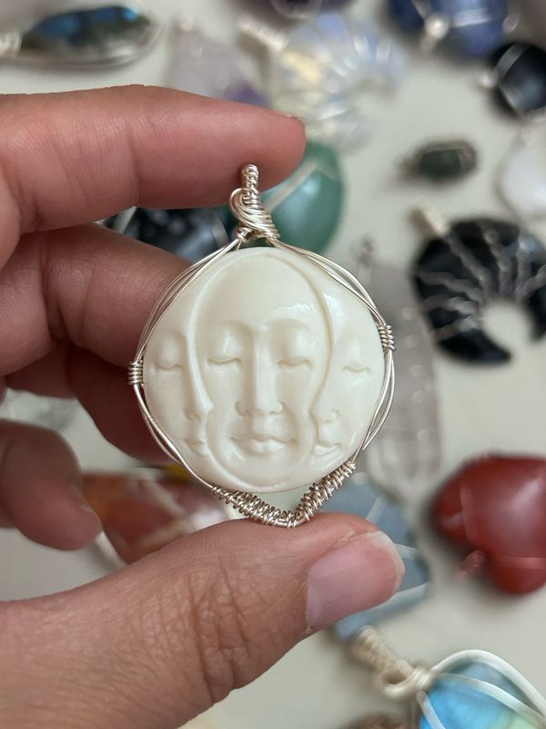 Triple Moon Bone Carving