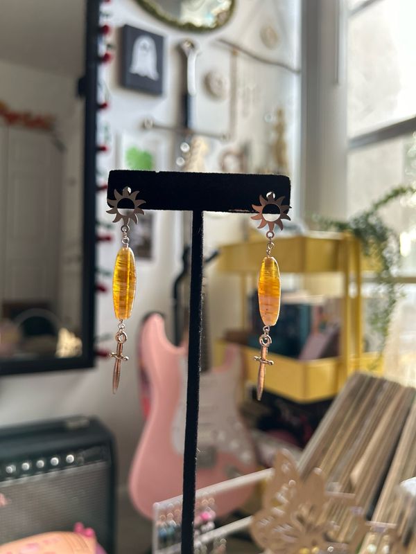 Sun And Sword Earrings With Glass Beads