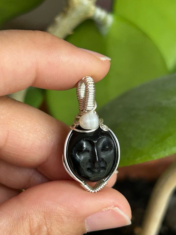 Buffalo Horn Face Carving With A Little Pearl