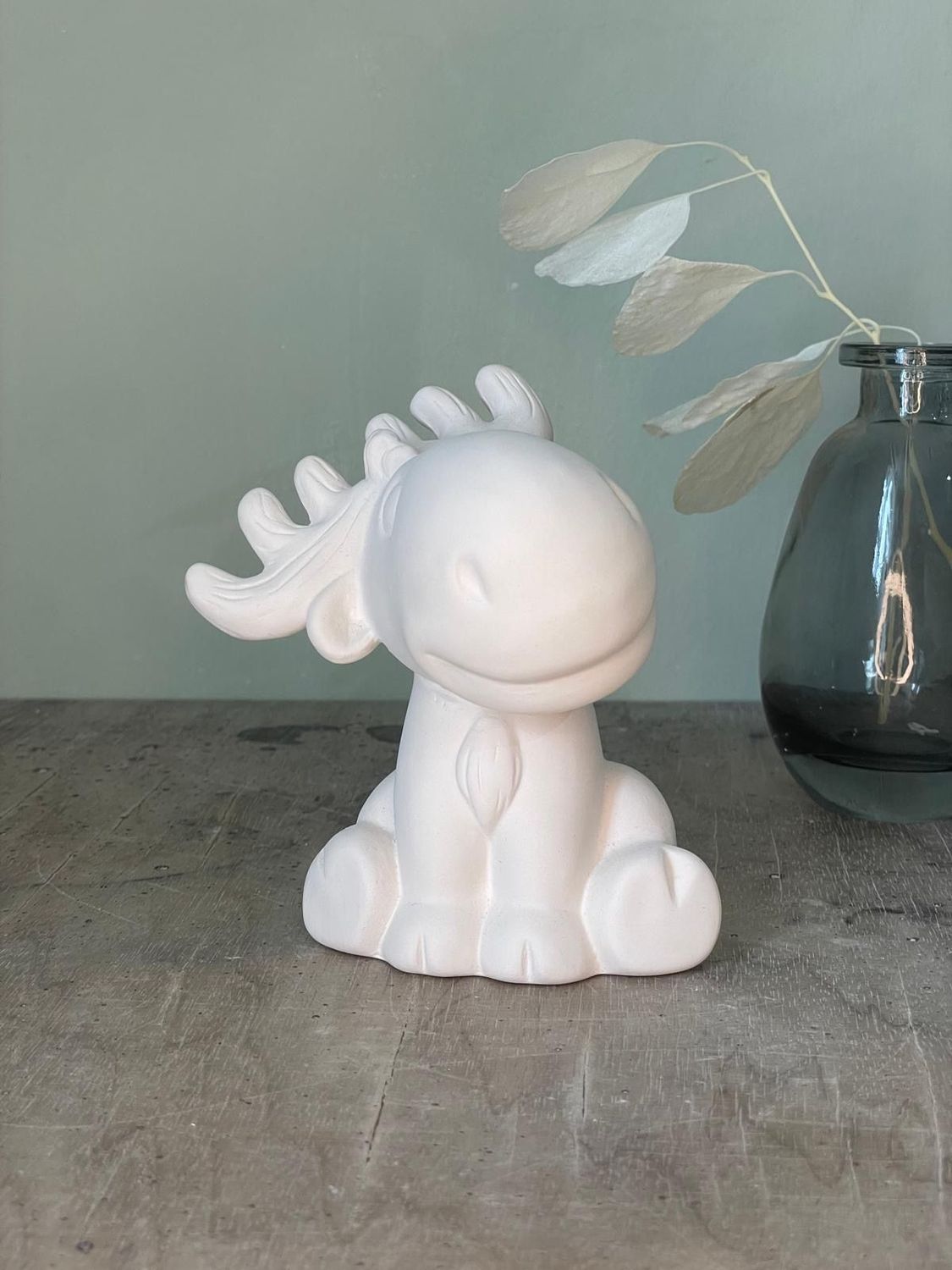 Figur Elch sitzend