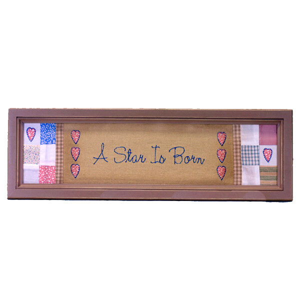 NL561 A Star is Born Framed Stitchery