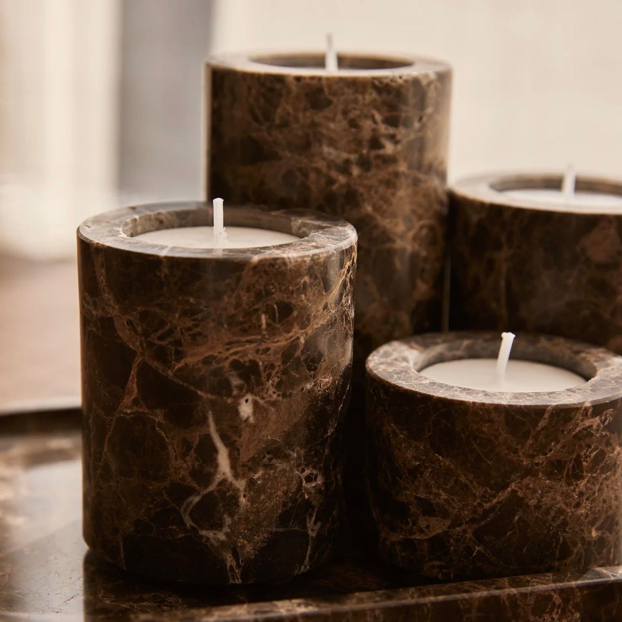 Marmer theelichthouders bruin