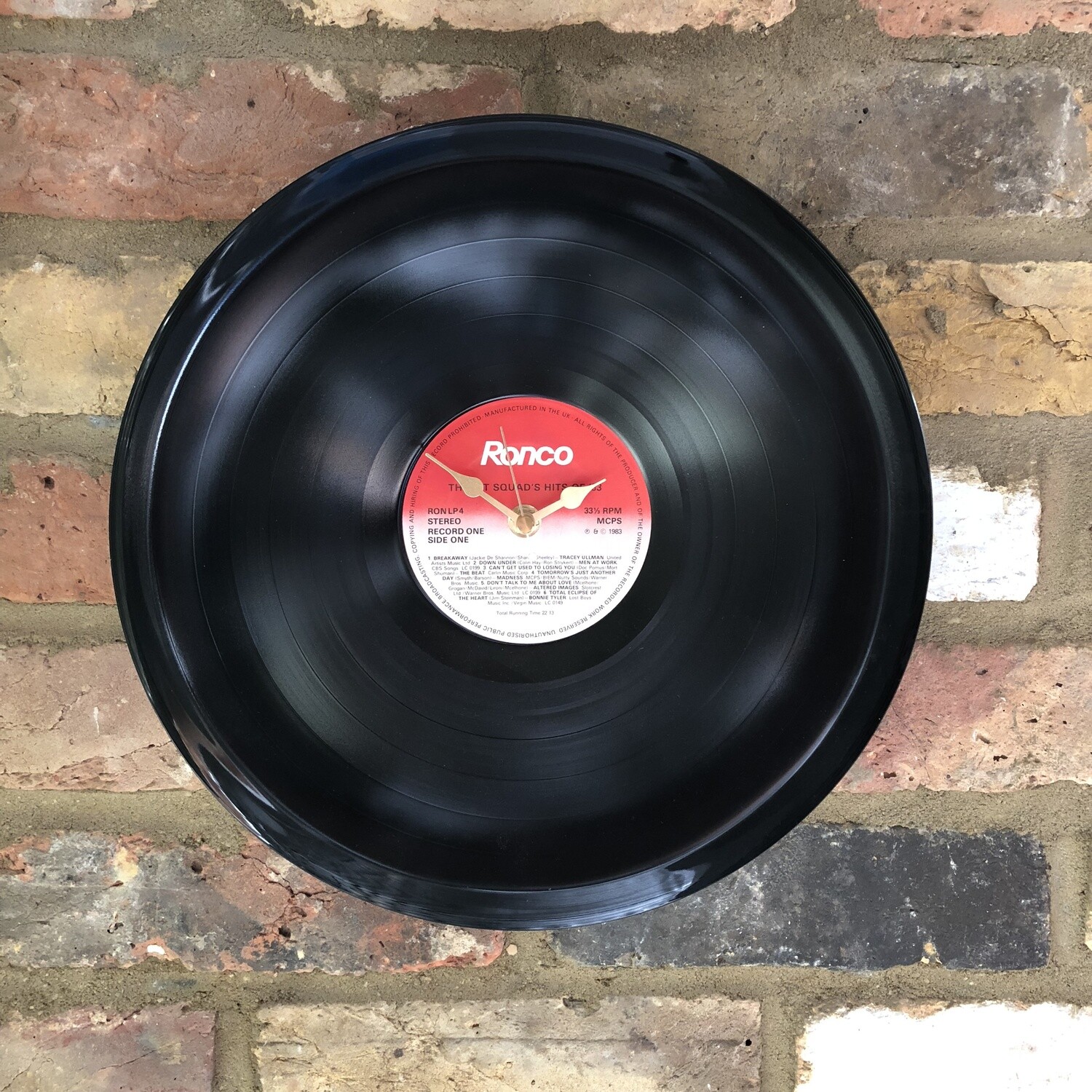 Stretched 12&quot; Vinyl LP Clock - &#39;The Hit Squad&#39;s Hits of &#39;83&#39; - Featuring Tracey Ullman, Madness and Bonnie Tyler. Ronco Records.