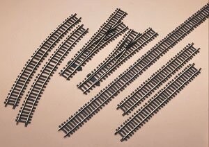 AM. MODELS; 27" radius curve section; Code 148 rail; each; (have 24)