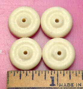 TIRE, white solid rubber ; 11/16",  for various Tootsietoy cars (each)