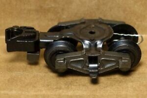 TRUCK, d/c 4-whl KC, XA12A057; action; for Action freight cars; complete with pickup lever assembly (each; repro)