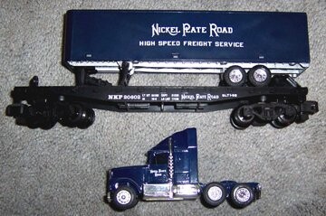 NKP FLAT CAR with ERTL trailer load;# 20602; NASG 1992; (Load boxed separately). Boxed load, but no box for flat car. EX