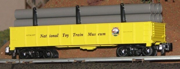 TCA-TTM  GONDOLA #1977 with Pipe Load (TCA TTM; 2003); MIB; (Lnl 48230)