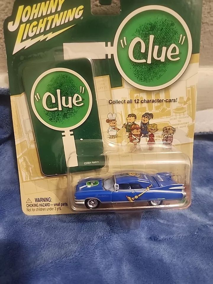 CADILLAC ELDORADO; 1959; blue;  "CLUE" car; new in original pkging;  (J  Lightning); have 1
