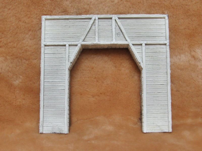 SINGLE TIMBER TUNNEL PORTAL, cast, unpainted; (have 1 left); See Note for size.