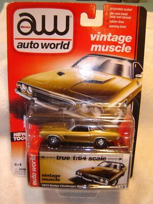 DODGE CHALLENGER RALLYE; 1973; gold & black; Auto World; (new in pkg); (have 2).