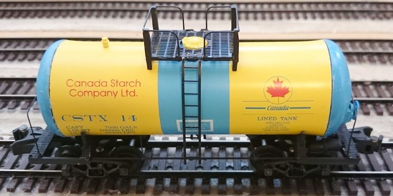 CANADA STARCH CO. LTD 7000 gallon TANK CAR #14; (RSSVP EXCLUSIVE); blue & yellow; DOWNS MODEL RR; NIB (red box); Highrail. SEE NOTE.