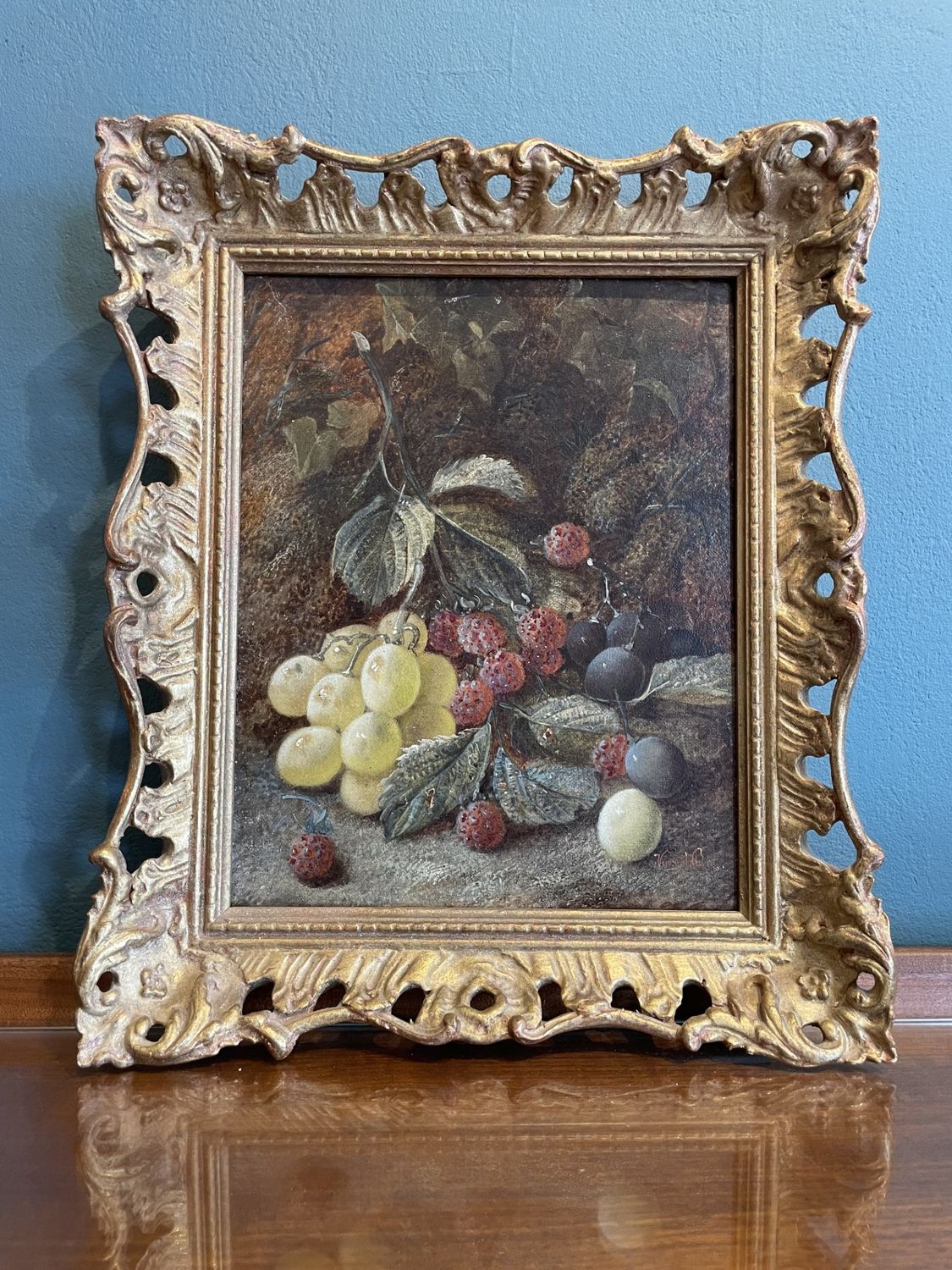 Raspberries and Grapes on a Mossy Bank