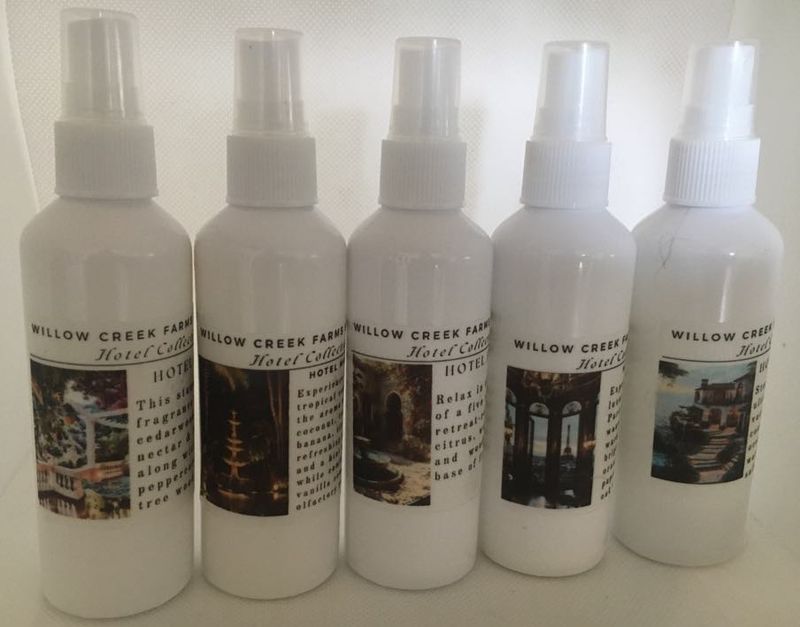 Collection of 5 white spray bottles with labels. 