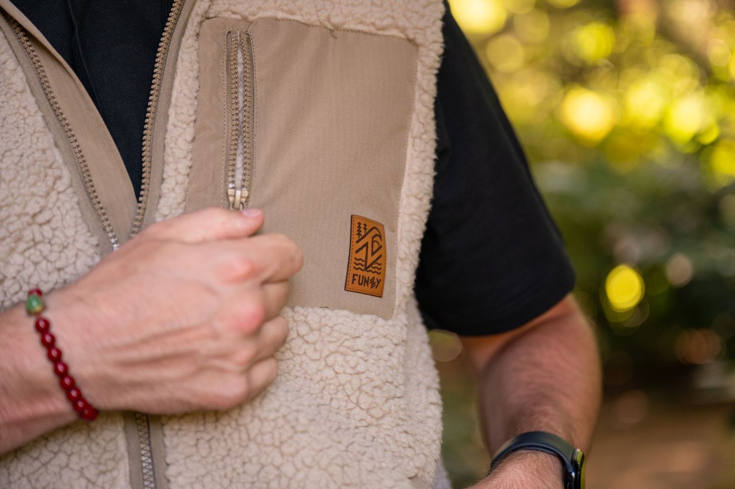 Bodywarmer en sherpa beige