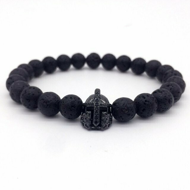 Bracelet handmade en pierre naturelle  de lave,  et perle motif Star wars en métal gun, perles de 8 mm, diam : 5,5 cm, neuf