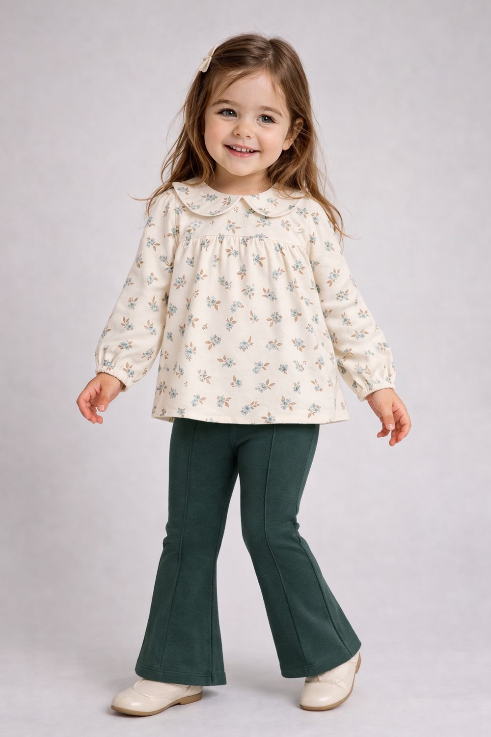 Mayoral floral blouse with flared trousers
