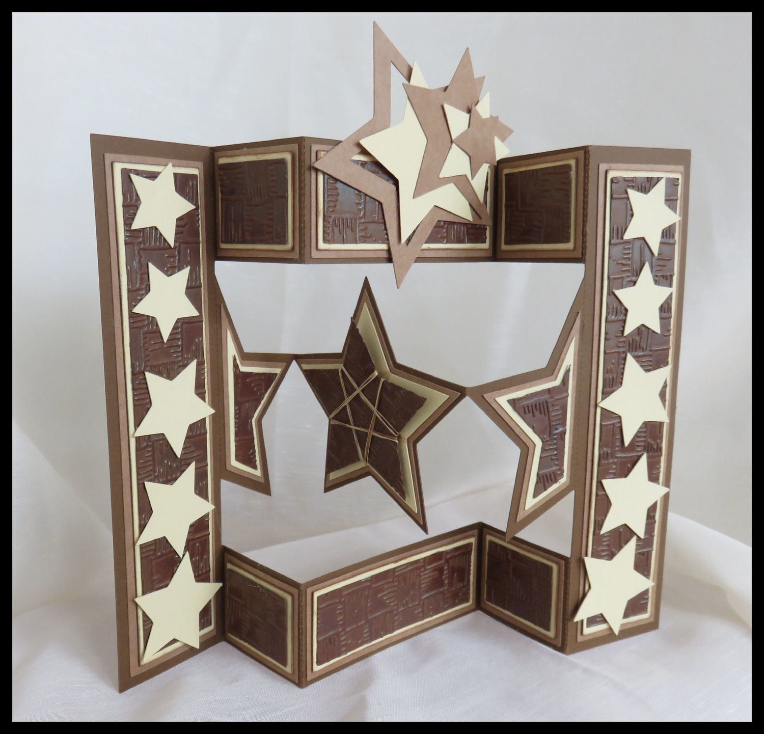 Shutter card tri fold with star shaped inner panels