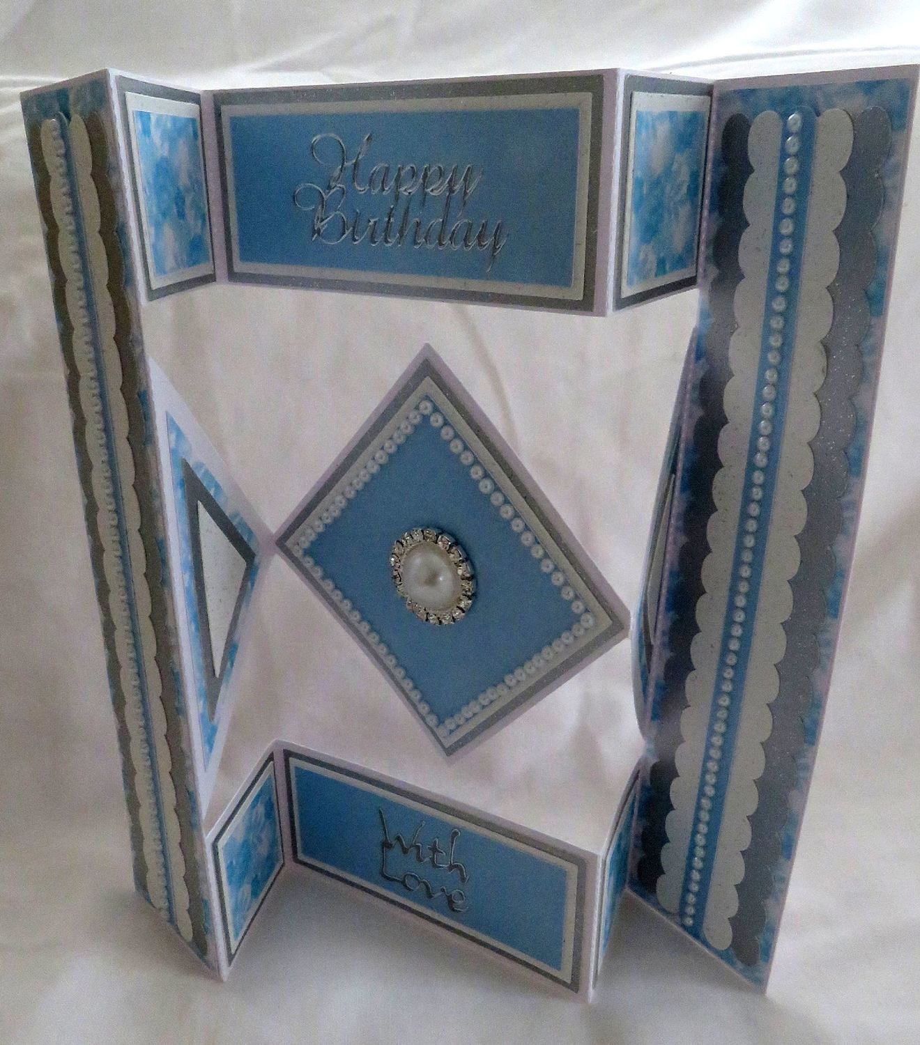 Shutter card tri fold with diamond shaped inner fold panels