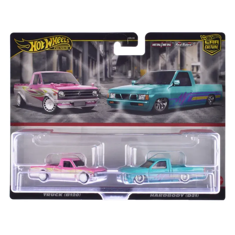 1975 Datsun Sunny (B120) Pickup Truck Pink and White with Graphics and 1993 Nissan Hardbody (D21)