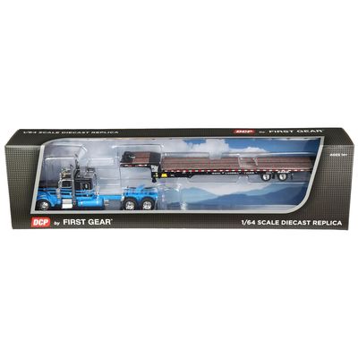 Peterbilt Model 389 Blue and Black Hauling Landoll