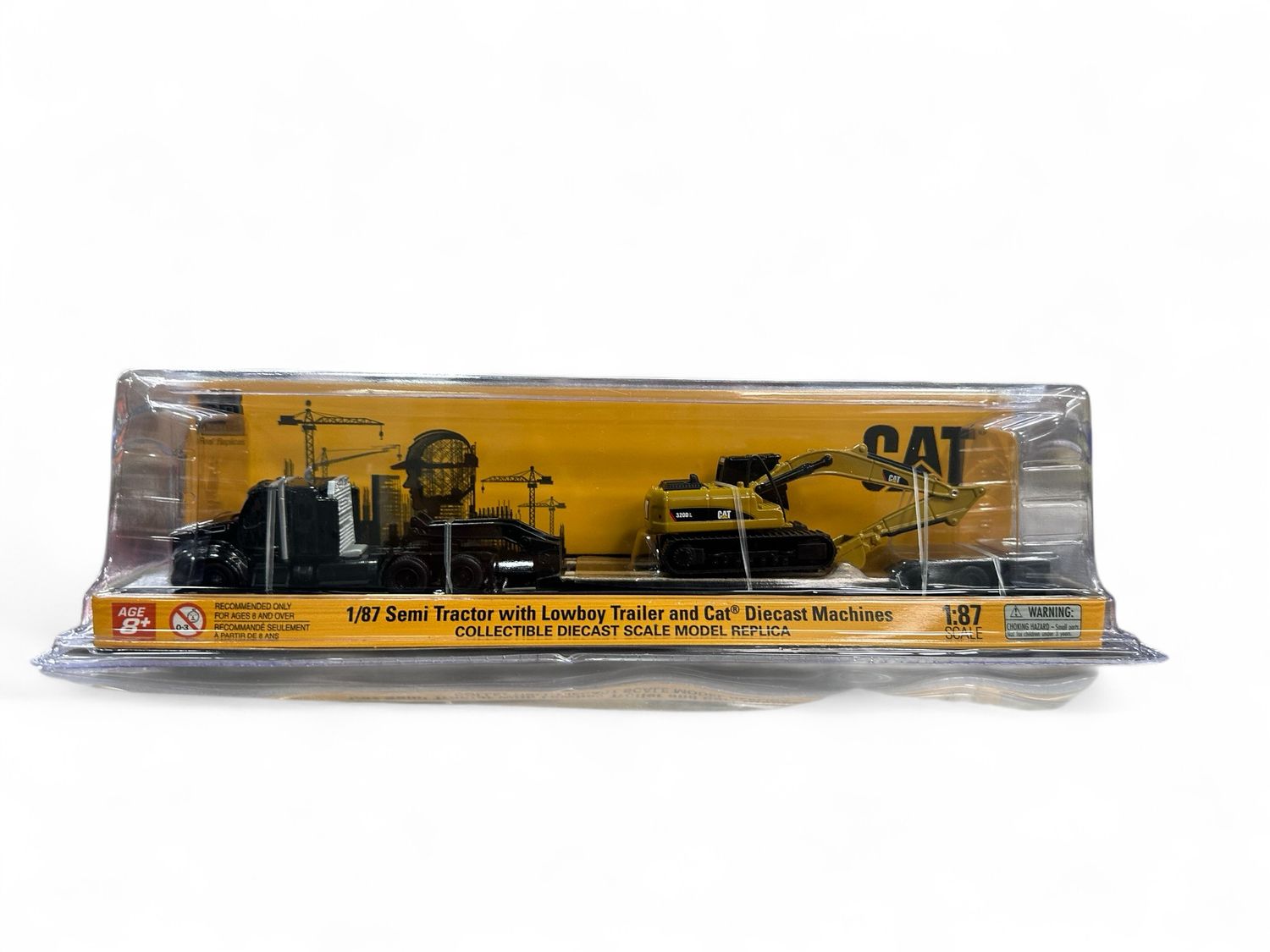 1/87 semi tractor with lowboy trailer and cat Diecast machines 1/87 semi tractor with lowboy trailer and cat Diecast machines
