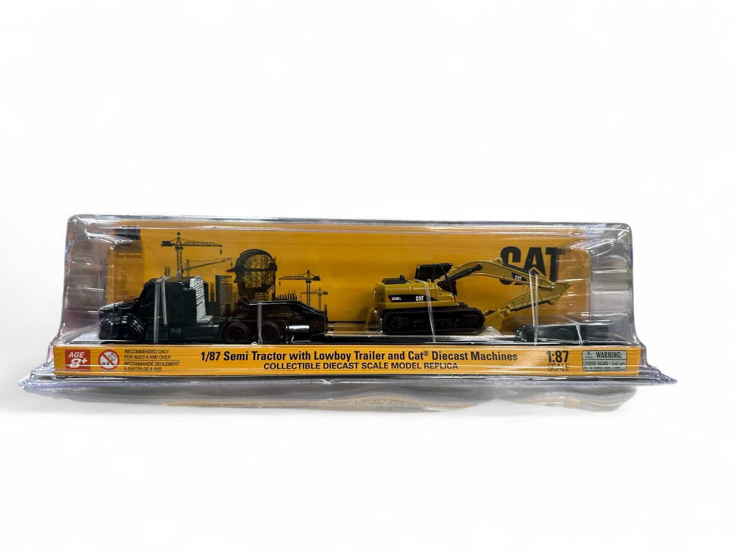 1/87 semi tractor with lowboy trailer and cat Diecast machines 1/87 semi tractor with lowboy trailer and cat Diecast machines