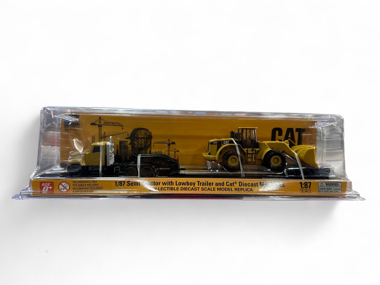 1/87 semi tractor lowboy trailer and cat Diecast machines 1/87 semi tractor lowboy trailer and cat Diecast machines