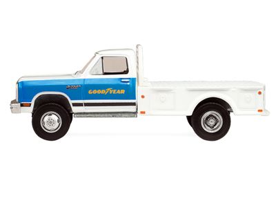 1:64 Dually Drivers Series 17 - 1981 Dodge Ram W350 Power Ram Dually Flatbed - Goodyear