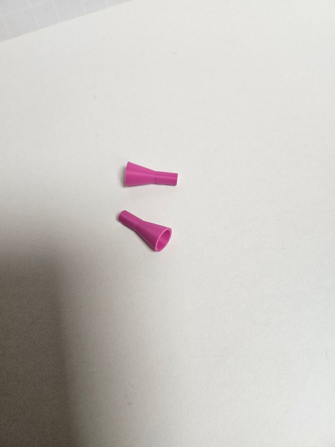 Konen 10mm für 2mm Schaft. Margenta