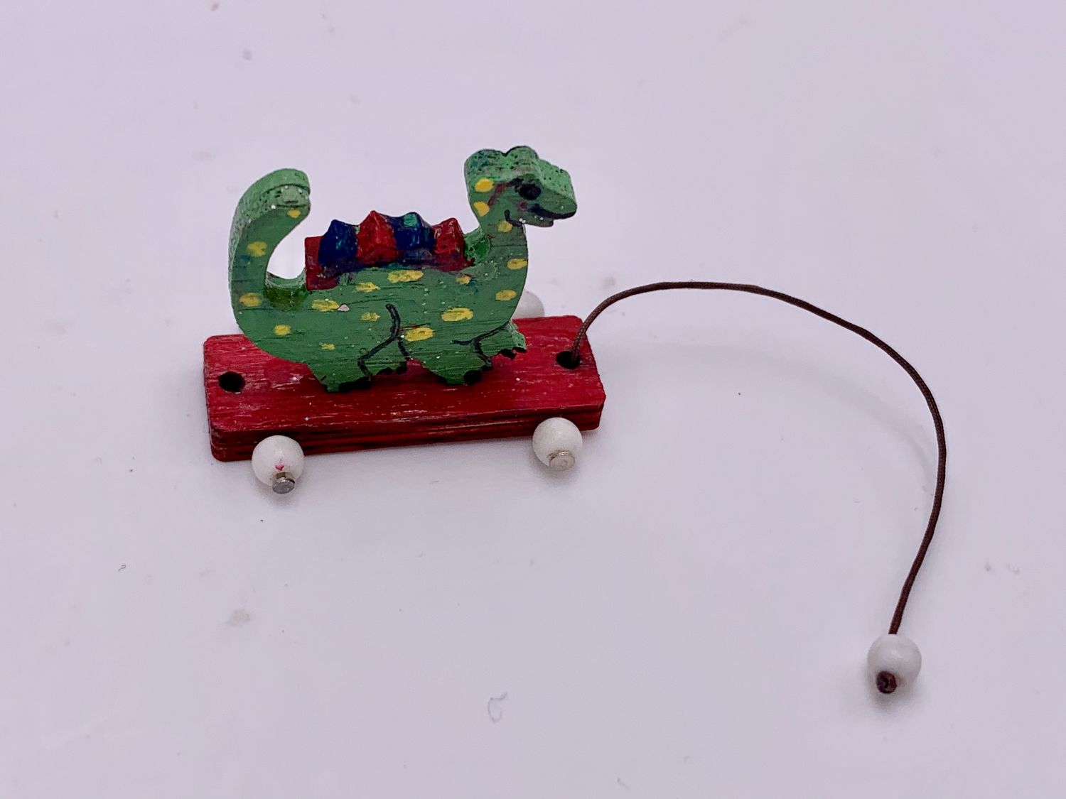 HAND-PAINTED DINOSAUR PULL TOY 1:12