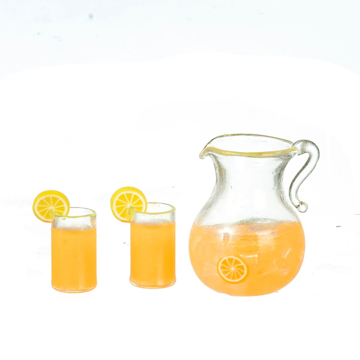 Orange juice pitcher and glasses