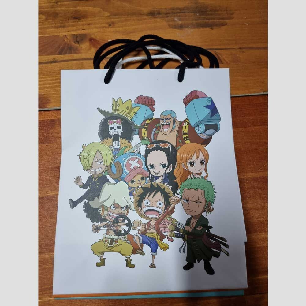 Shopper Onepiece con 9 regali - (5 pezzi)