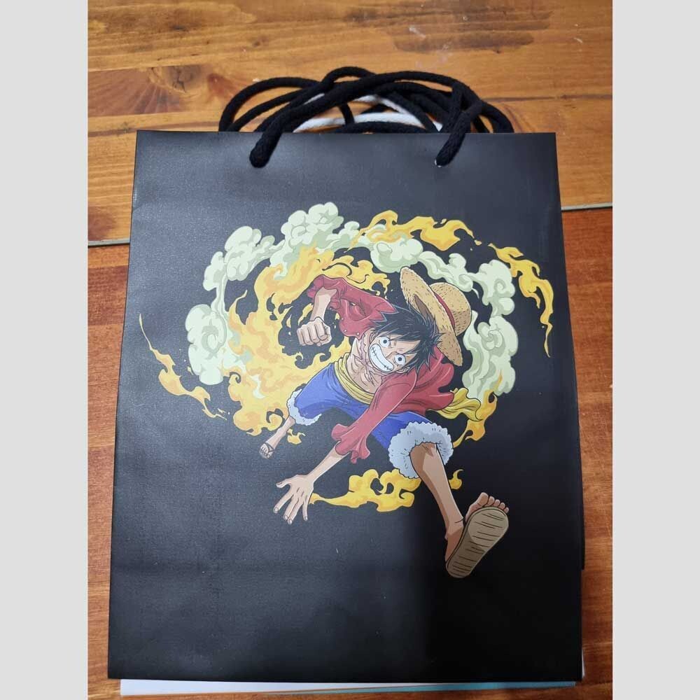 Shopper Onepiece con 9 regali - (5 pezzi)