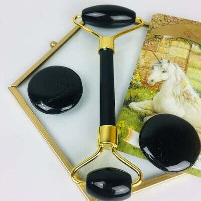 rouleau de massage en obsidienne noir visge et corps