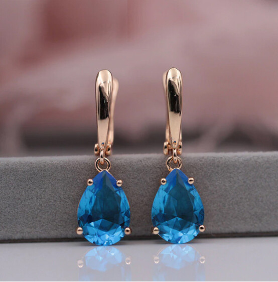 Mary X - Light blue sapphire rose gold earring