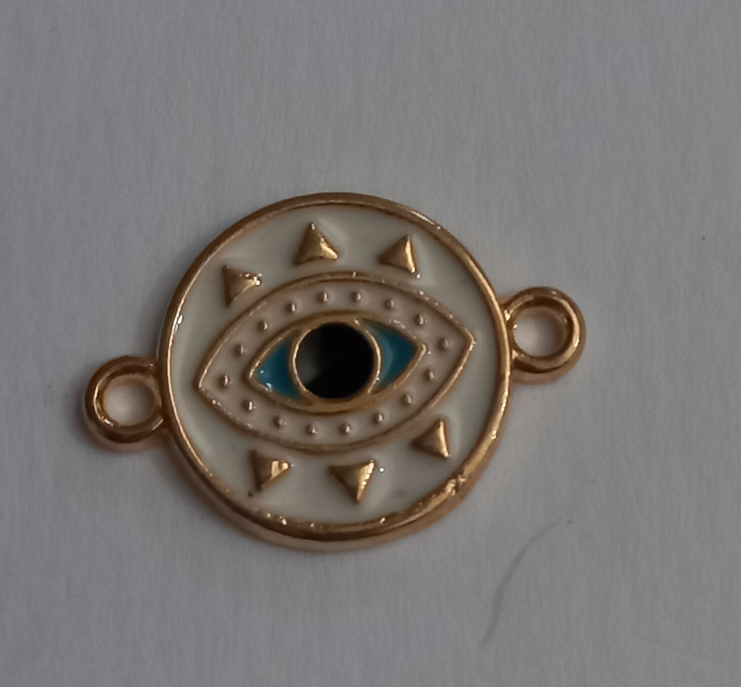 Evil eye gold round