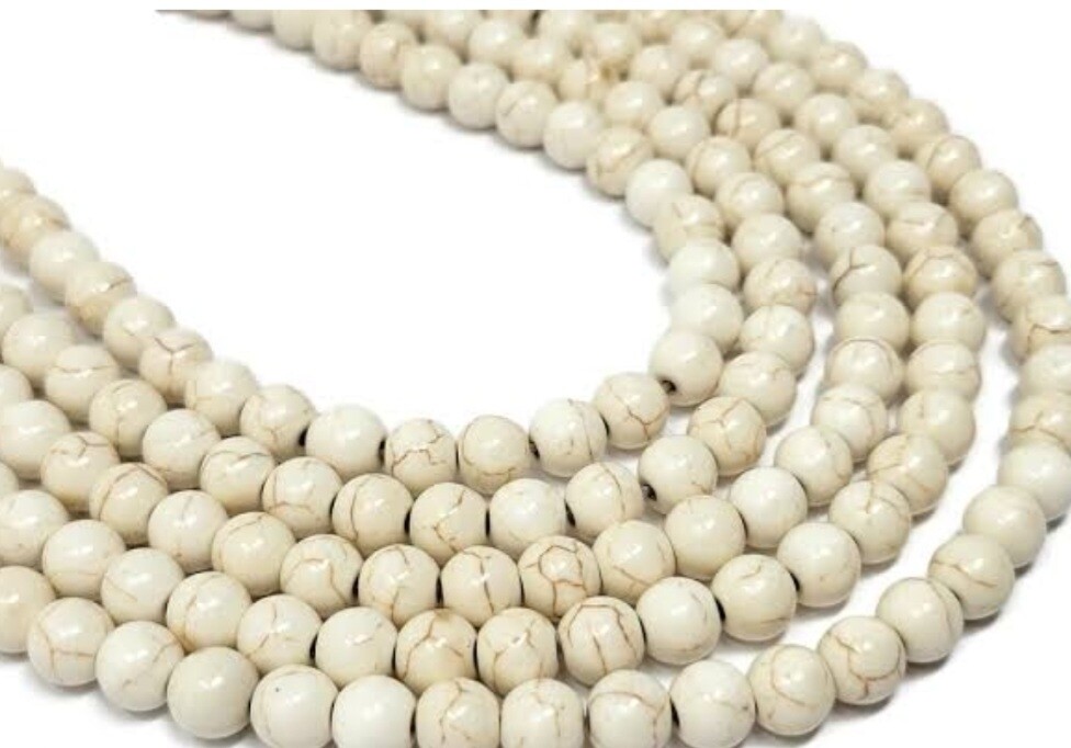 H003: HOWLITE ROUND 4mm  (+-100)