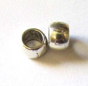 F8687:  Silver spacer round 8mm -50pc