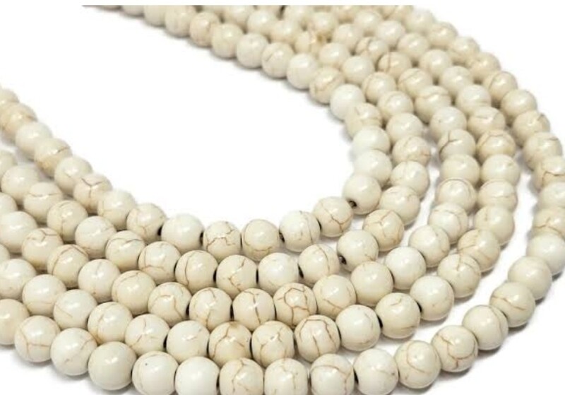 H003: HOWLITE ROUND 4mm  (+-100)