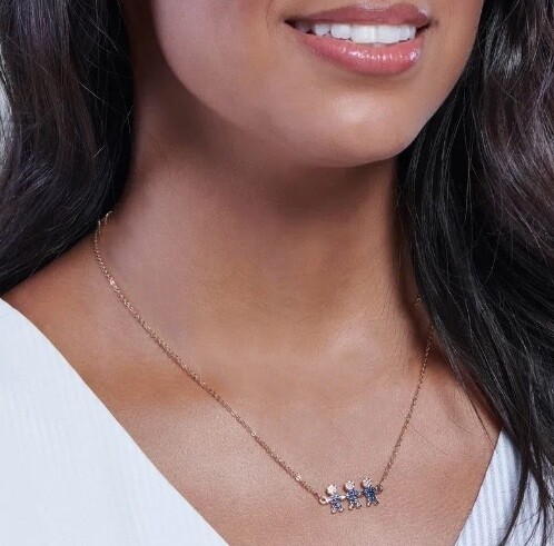 Gold-plated three boys necklace with black rhodium and blue zirconia