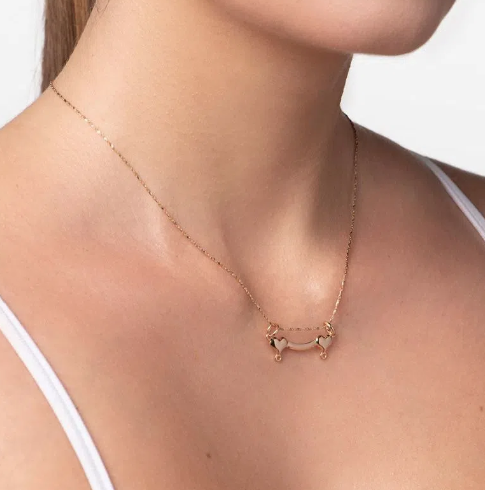 Gold-plated yoke for two pendants