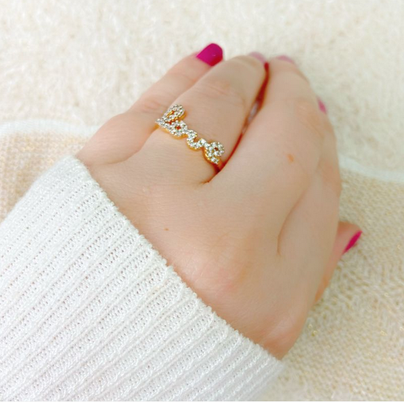 Gold plated love ring with zirconia