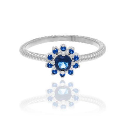 Rhodium plated flower ring with blue zirconia