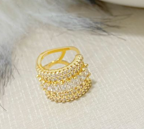 Gold plated ear cuff with studded zirconia
