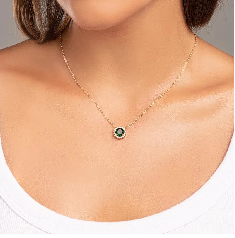 Gold-plated necklace with green crystal and white zirconia