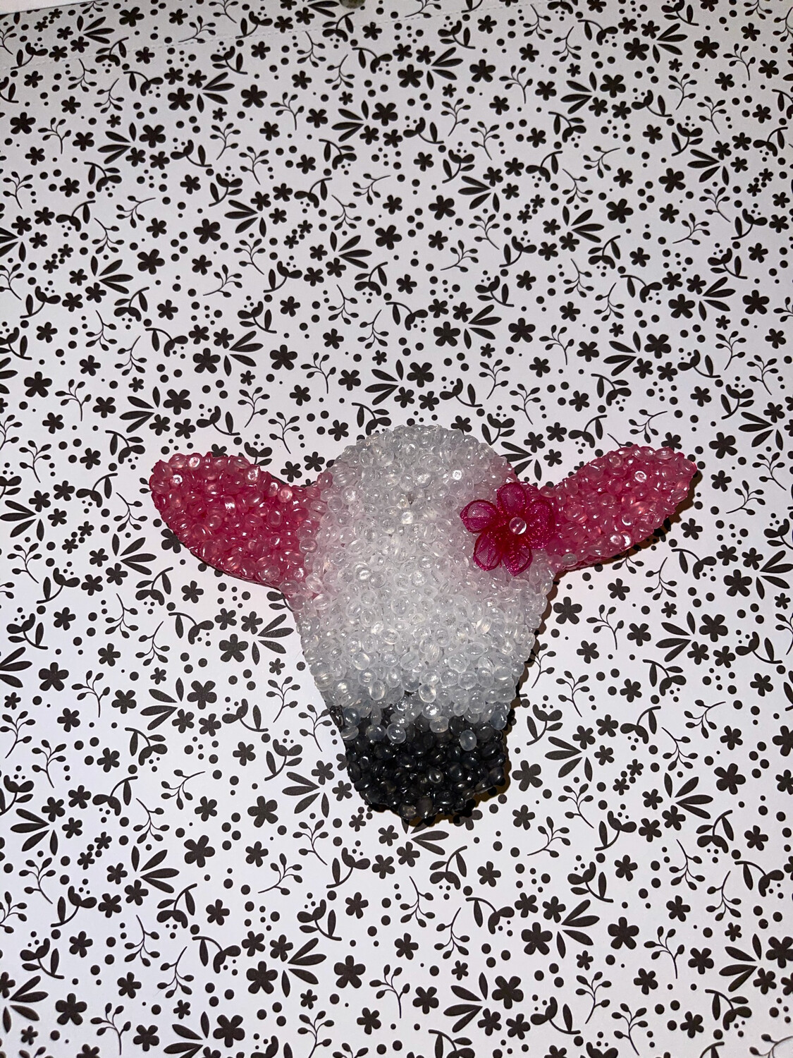 Cow with Pink Flower