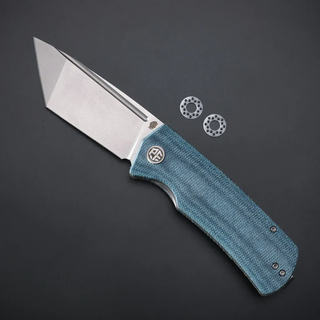 Petrified Fish Beluga Tanto Blue micarta