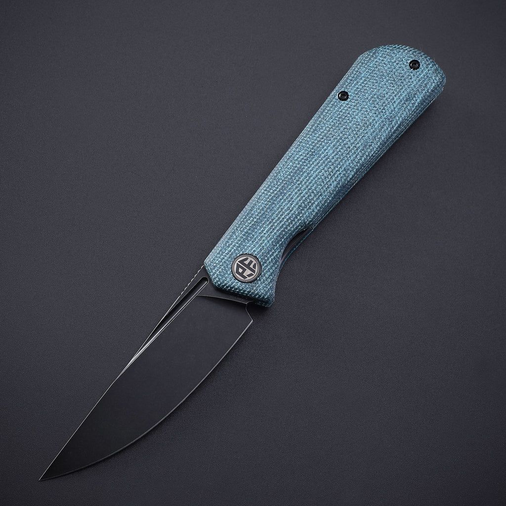 Petrified Fish Viking Blue micarta